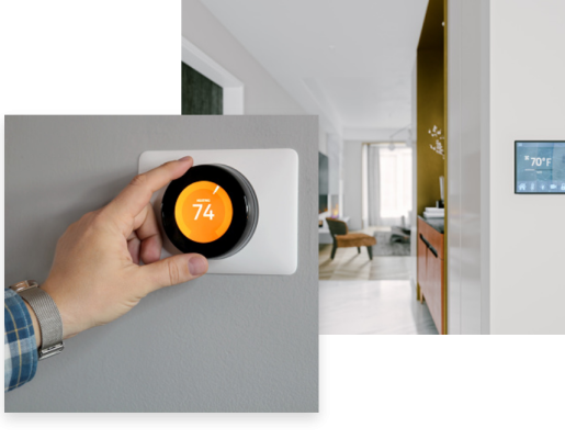 A hand adjusting a thermostat to conserve energy.